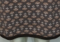 Preview: Rock-Baumwolljersey-braun-apricot-Blüten-Blätter-beige-Saum