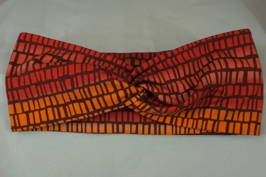 knotenstirnband-jersey-baumwolle-pepafarina-orange-rot-gemustert