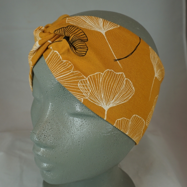 knotenstirnband-jersey-baumwolle-pepafarina-gelb-schwarz-creme-ginkomuster