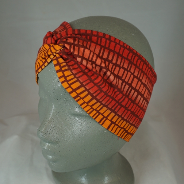 knotenstirnband-jersey-baumwolle-pepafarina-orange-rot-gemustert